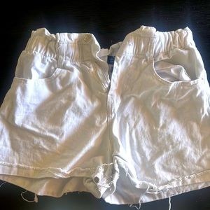 I am selling the cutest white denim shorts. They are so comfy.